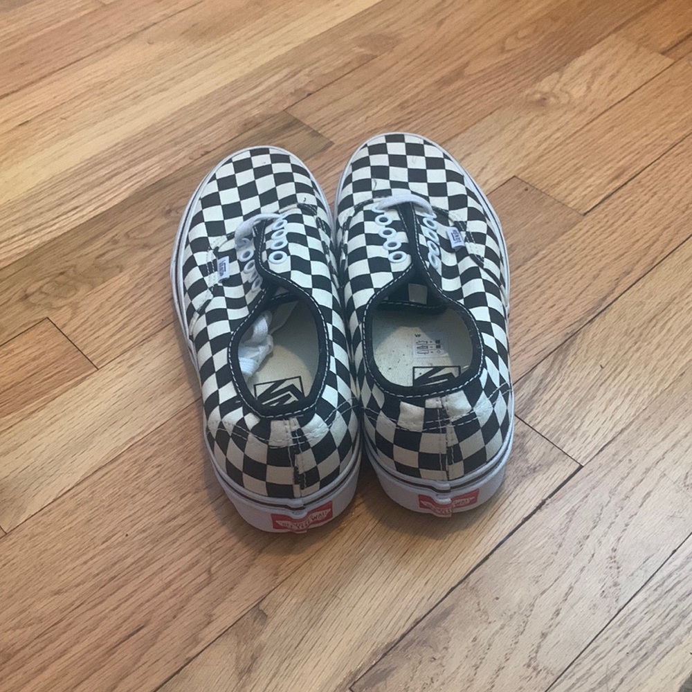 Black and white checkerboard Vans. Men: size 7.5 Women: size 9